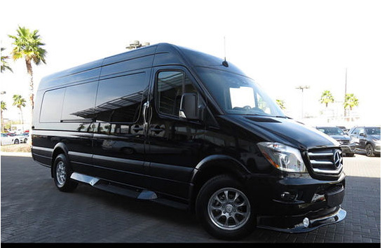 TROUBLEMAKER is a black Mercedes Sprinter bus with seating for 14 people