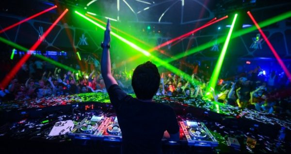 DJ hyping the crowd at a Las Vegas nightclub